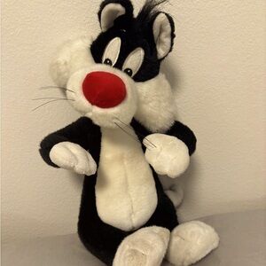 Sylvesterer the cat plush from the 1990s 
14 inches tall almost like new